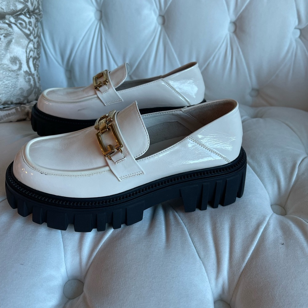 Ivory patent leather circus platform shoes